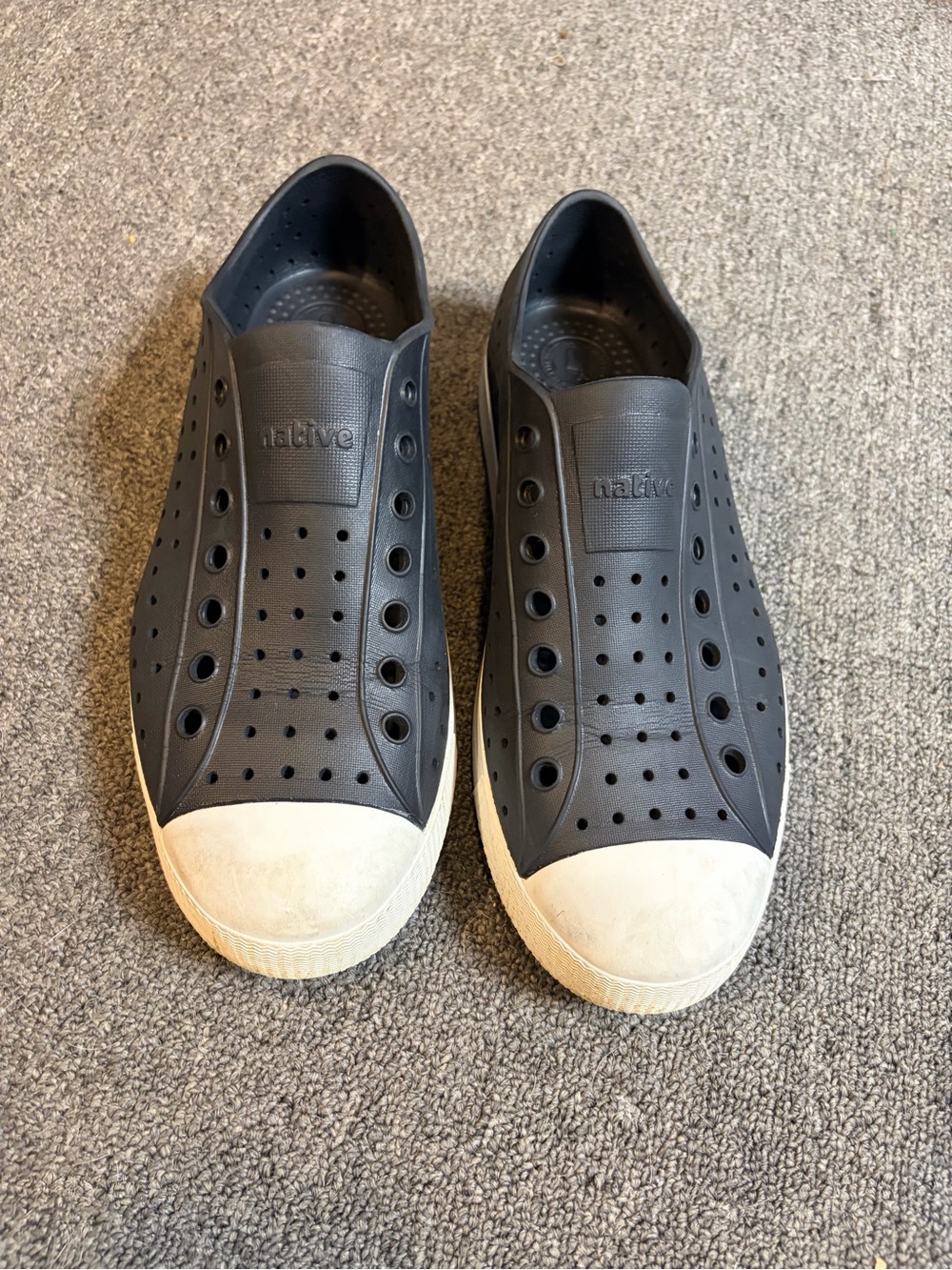 Native Slip-On Sneakers in Black with White Toe